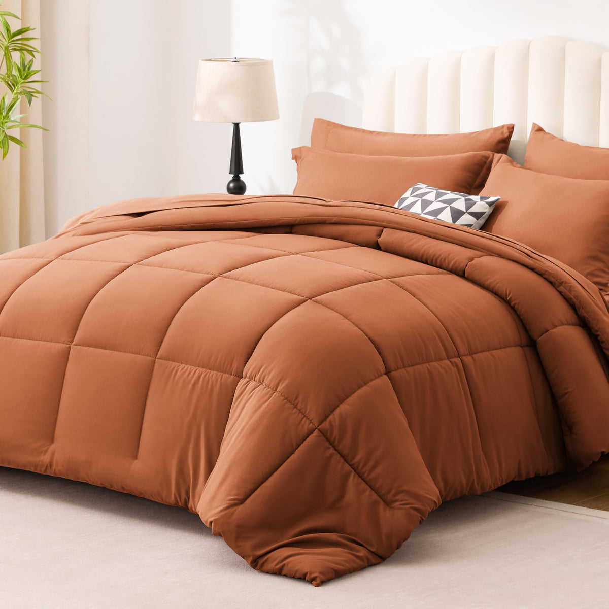 Love's cabin 7-piece set flat sheet on bed with coordinated color options.