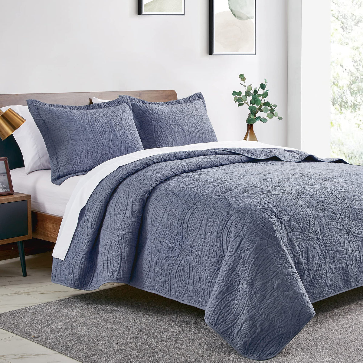Love's cabin blue bedspread close-up shows soft brushed polyester texture for daily comfort