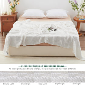 Love's Cabin beige muslin blanket complements warm decor.