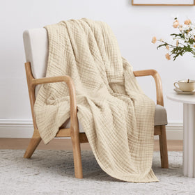 Love's cabin blanket close-up reveals soft 6-layer gauze texture and breathable cotton.