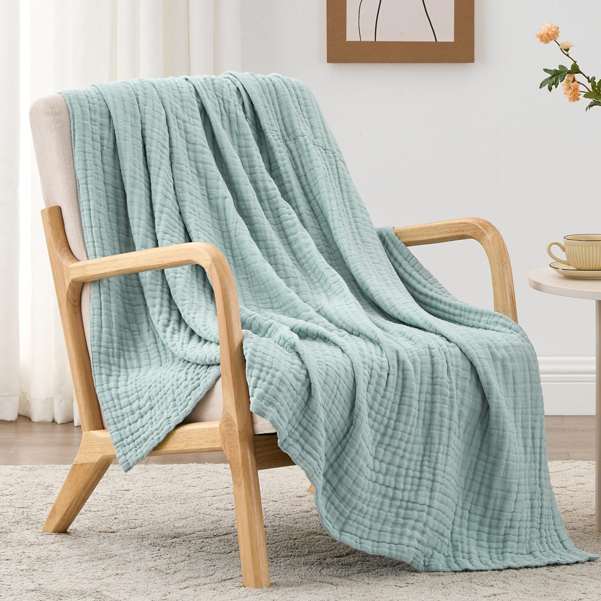 Love's cabin 6 layer muslin blanket with breathable gauze texture for cooler nights.