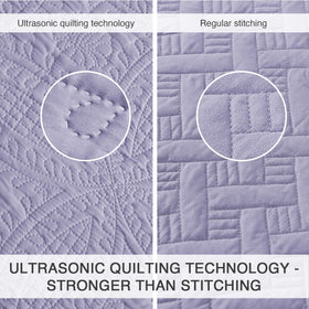 Love's cabin coin-pattern coverlet close-up shows embossed texture and durability.