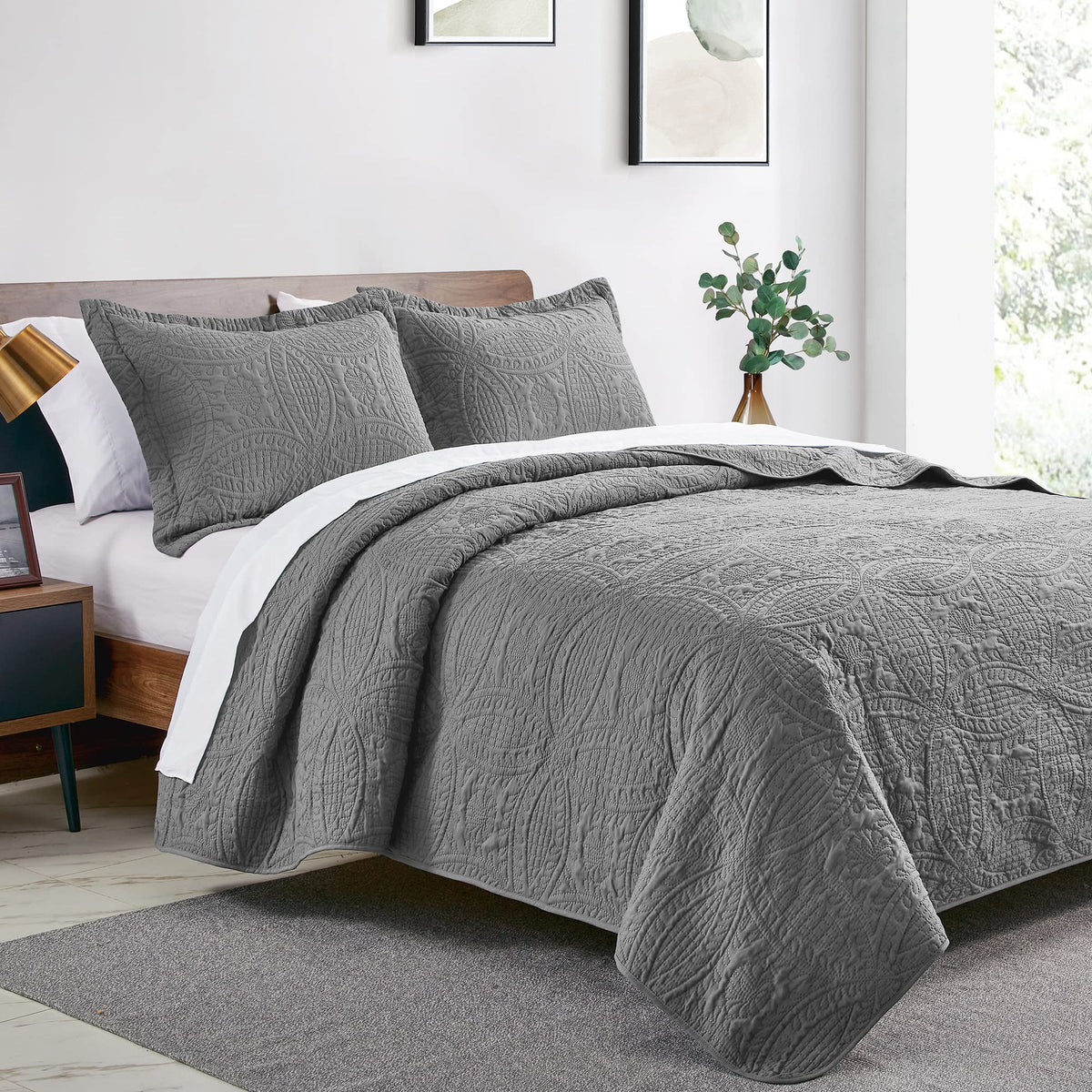 Love's cabin coin-pattern coverlet grey closeup highlights embossed texture and light feel.