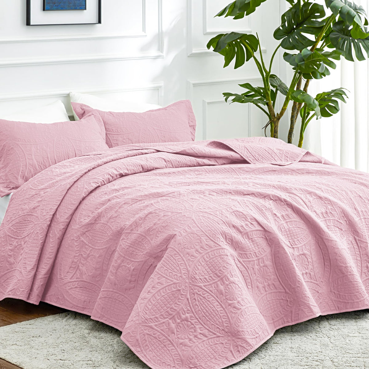 Love's cabin coin-pattern quilt close-up reveals lightweight texture ideal for all-season use.