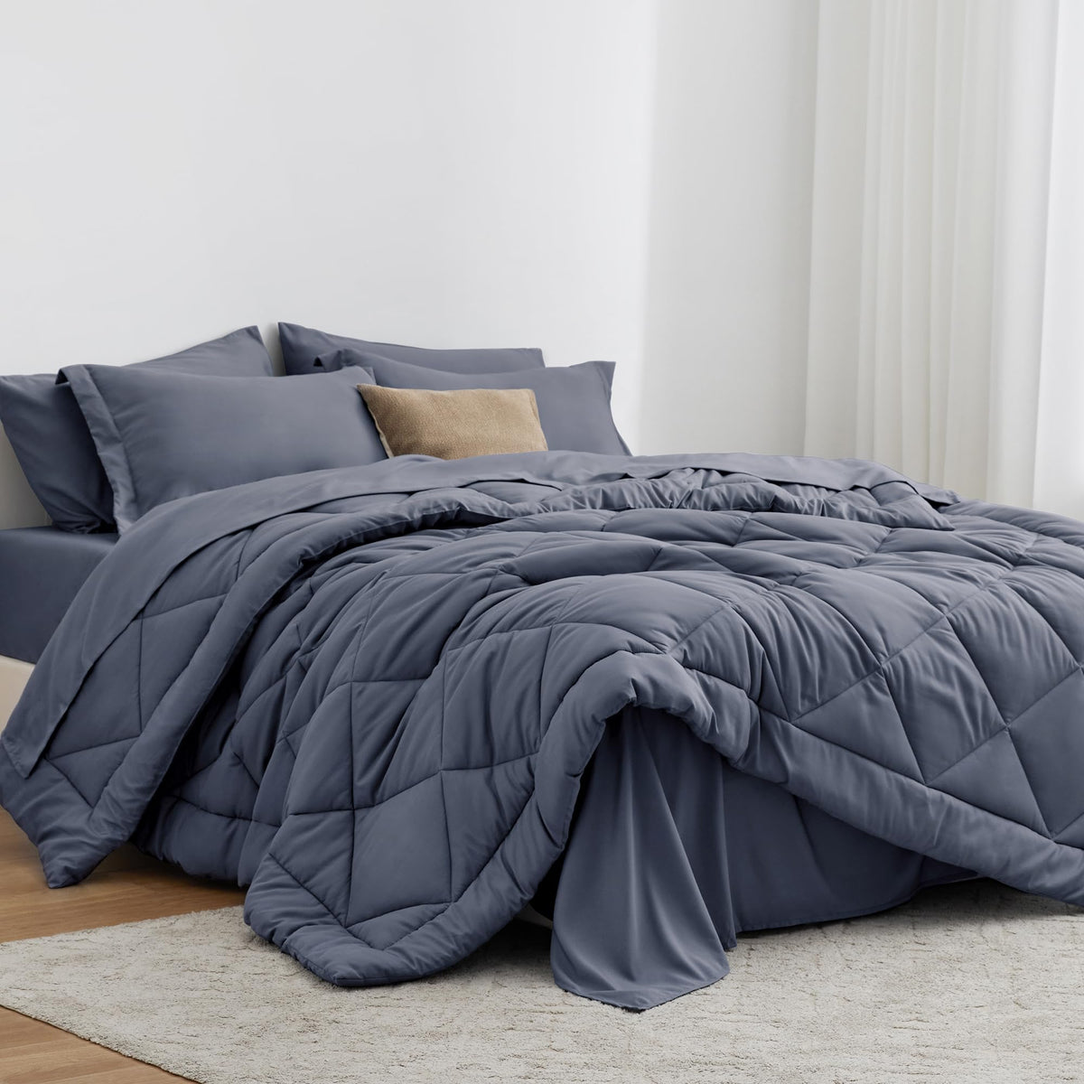 Love's cabin navy blue comforter set offers year-round warmth.