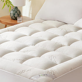Love's cabin king mattress topper closeup cover—breathable bamboo rayon blend for cooler sleep.