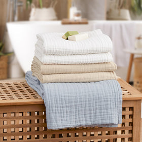 Love's Cabin king-size 108x90 blanket folded on bed.
