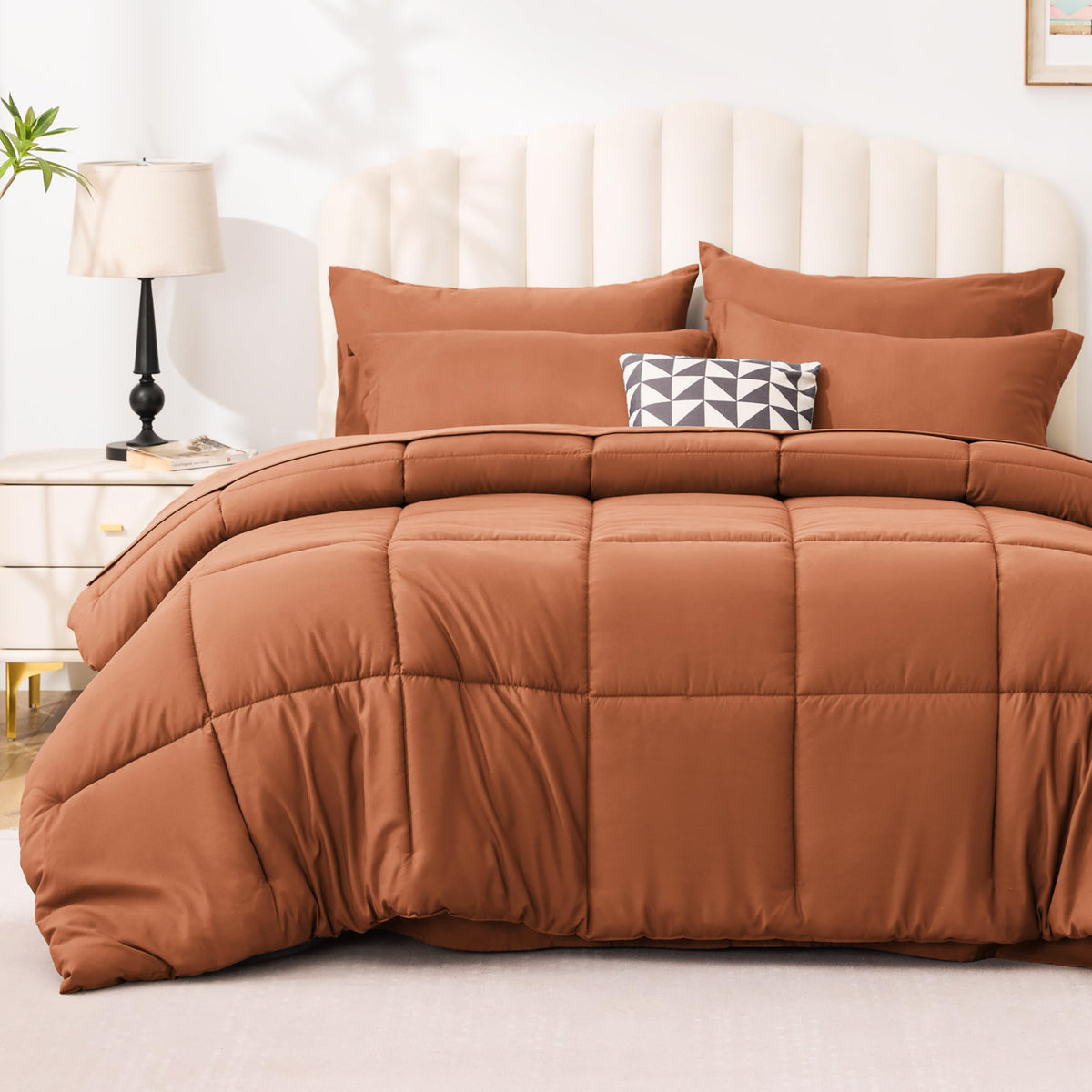 Love's cabin king-size burnt orange comforter on bed for all-season warmth and softness.