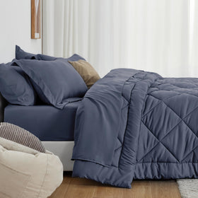 Love's Cabin navy blue fabric close-up reveals soft, breathable material.