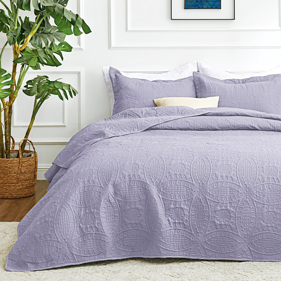 Love's cabin lavender bedspread on queen bed, side view, lightweight year-round comfort.