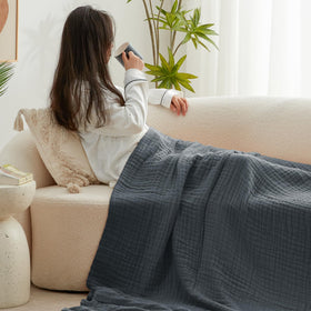Love's cabin lightweight muslin blanket feels airy for warm nights.