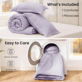 Love's cabin lavender bedding on bed with pillow visible, inviting calm bedroom vibe.