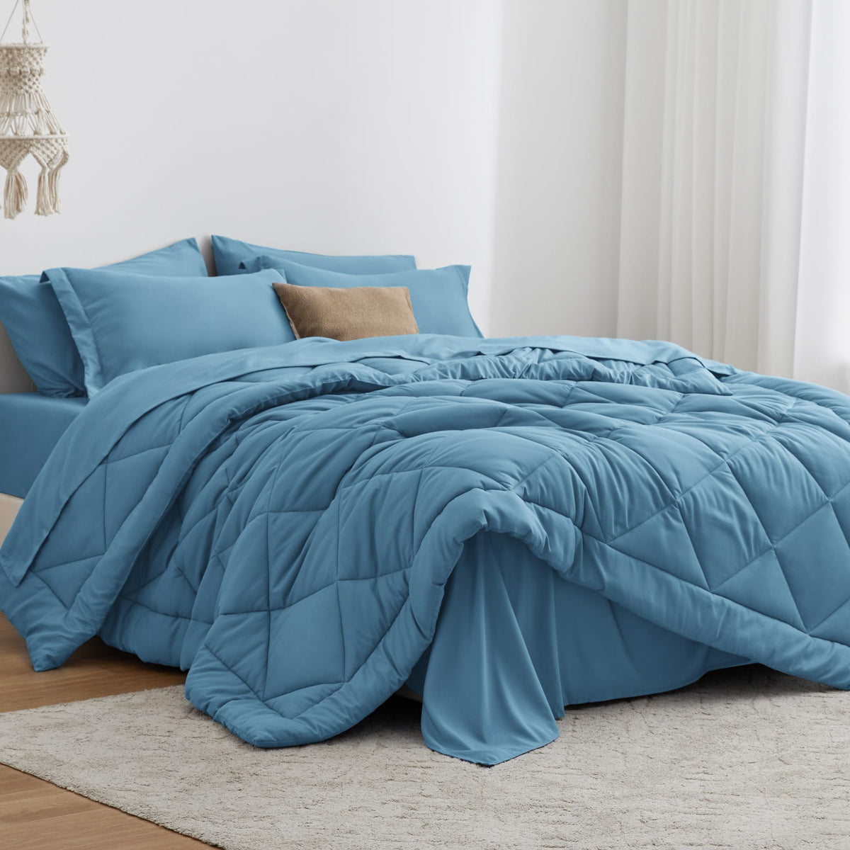 Love's cabin Mist Blue comforter set on a twin bed for all-season warmth