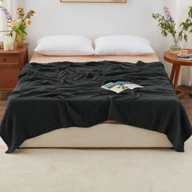 Love's Cabin muslin blanket lightweight and breathable for year-round comfort.
