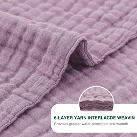 Beige Love's cabin muslin blanket complements modern décor with natural materials.