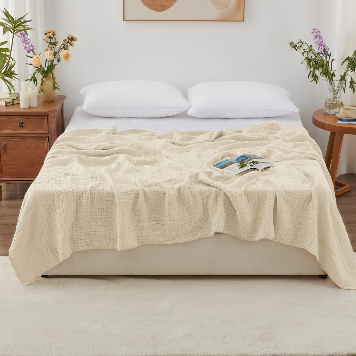 Love's cabin muslin blanket queen-size draped on bed, highlighting comfort