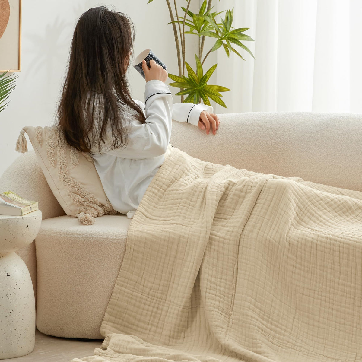Travel-ready Love's cabin muslin blanket folded, compact and lightweight