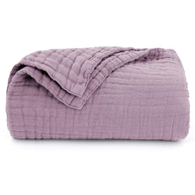 Love's Cabin muslin blanket being machine washed demonstrates easy care
