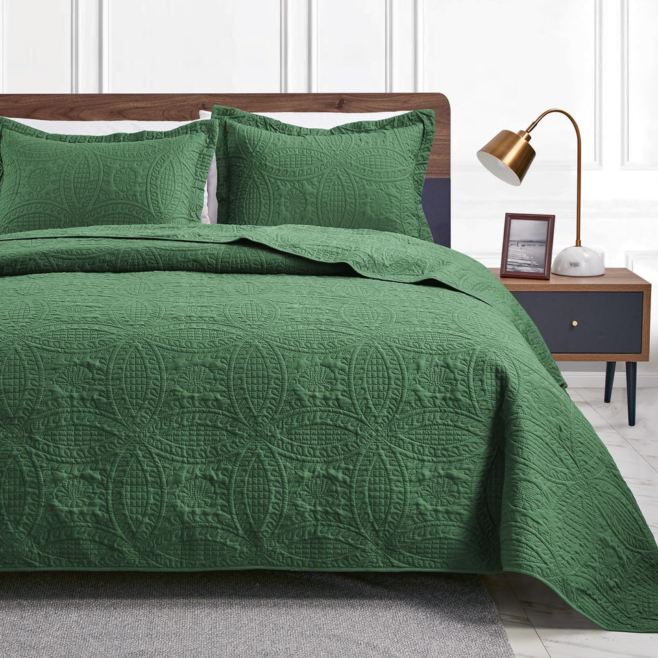 Love's cabin olive green coin-pattern quilt for queen bed adds modern style and easy layering.
