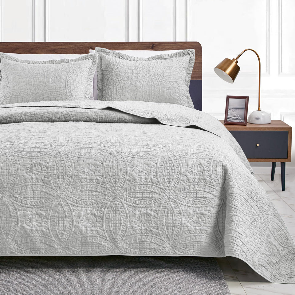Love's cabin queen quilt with coin pattern offers versatile all-season style for any bedroom.