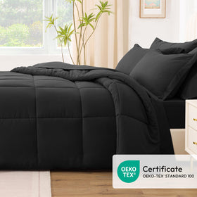 Love's Cabin ash black pillow shams complete the coordinated bed look.
