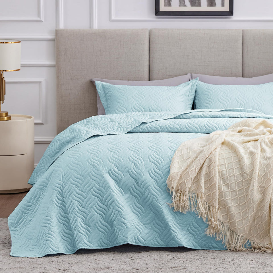 Love's cabin queen quilt light blue wave pattern for a fresh bedroom look.