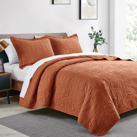 Love's cabin umber quilt set shows brushed polyester softness and modern style.