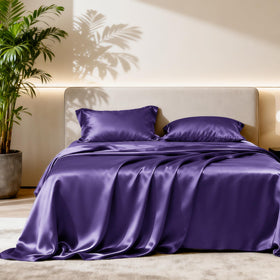 Love's cabin satin queen sheets set purple on bed, luxurious feel for a restful night.