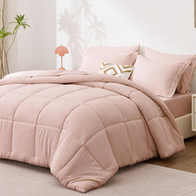 Love's cabin twin comforter set blush pink on bed illustrates coordinated, ready-to-make bedding look