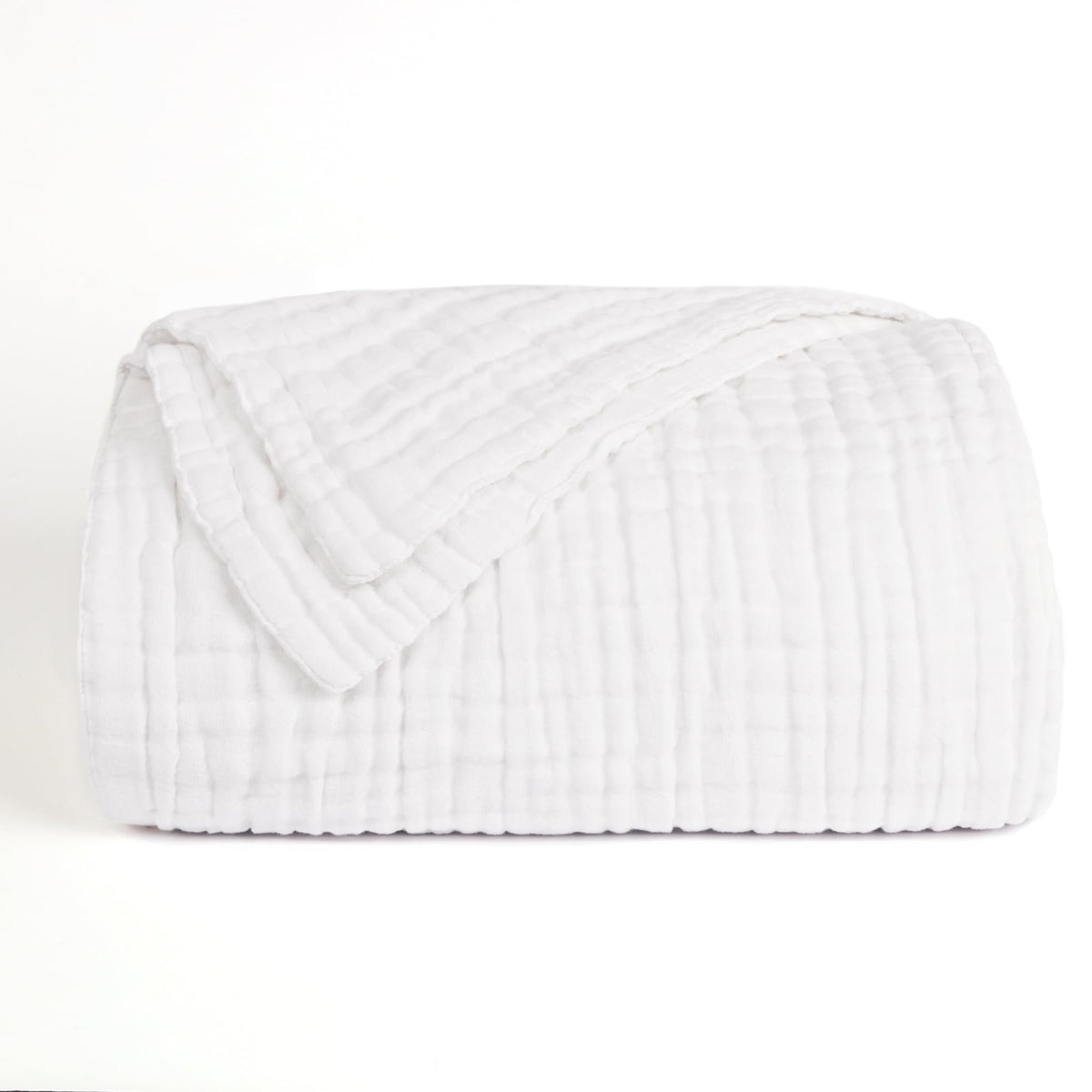 Love's Cabin white muslin blanket added as light layer on bed.