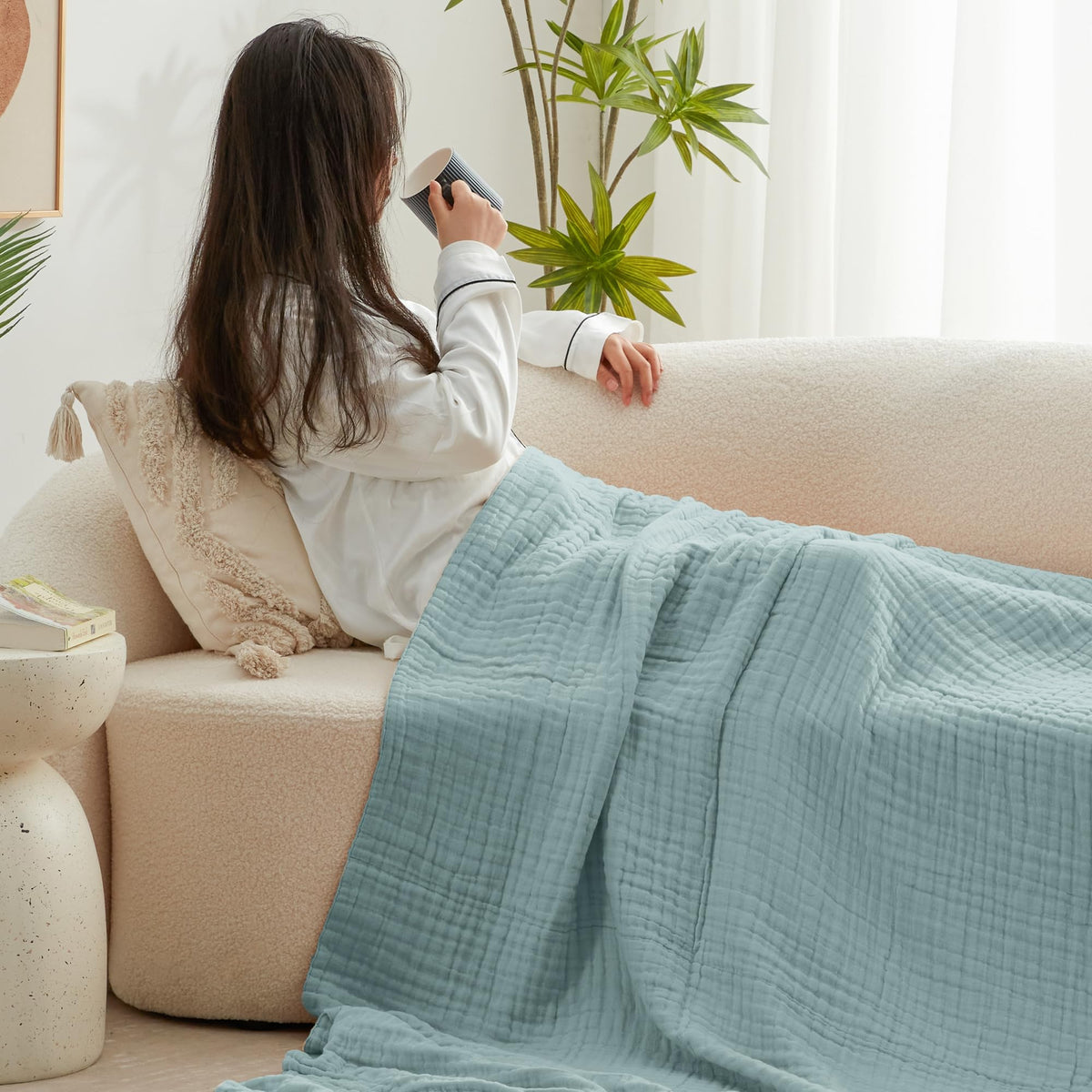 Love's Cabin cyan couch throw, lightweight warmth for evenings.