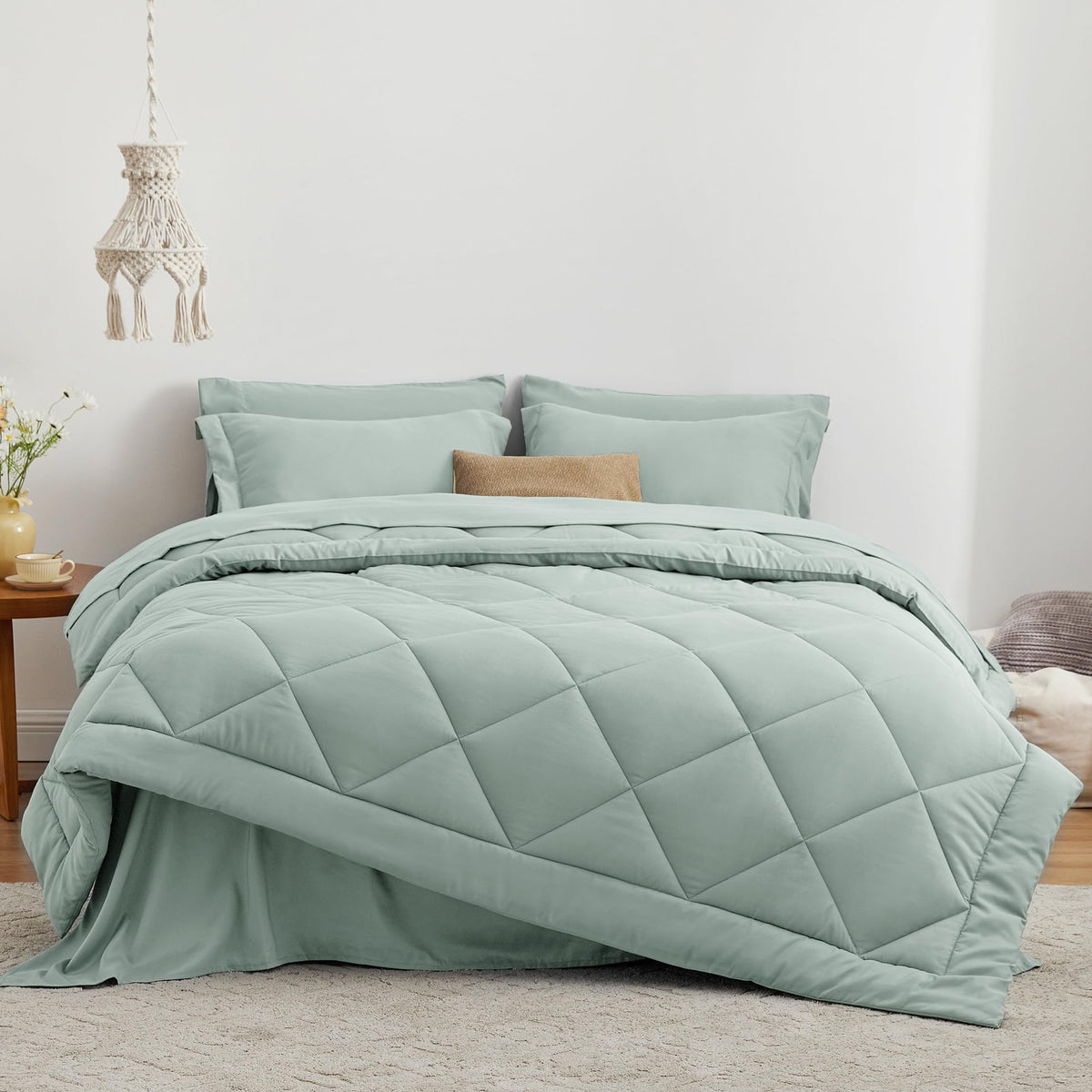 Love's cabin Aqua flat sheet close-up emphasizing a smooth, gentle touch for restful nights.