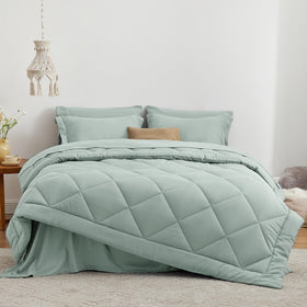 Love's cabin Aqua flat sheet close-up emphasizing a smooth, gentle touch for restful nights.