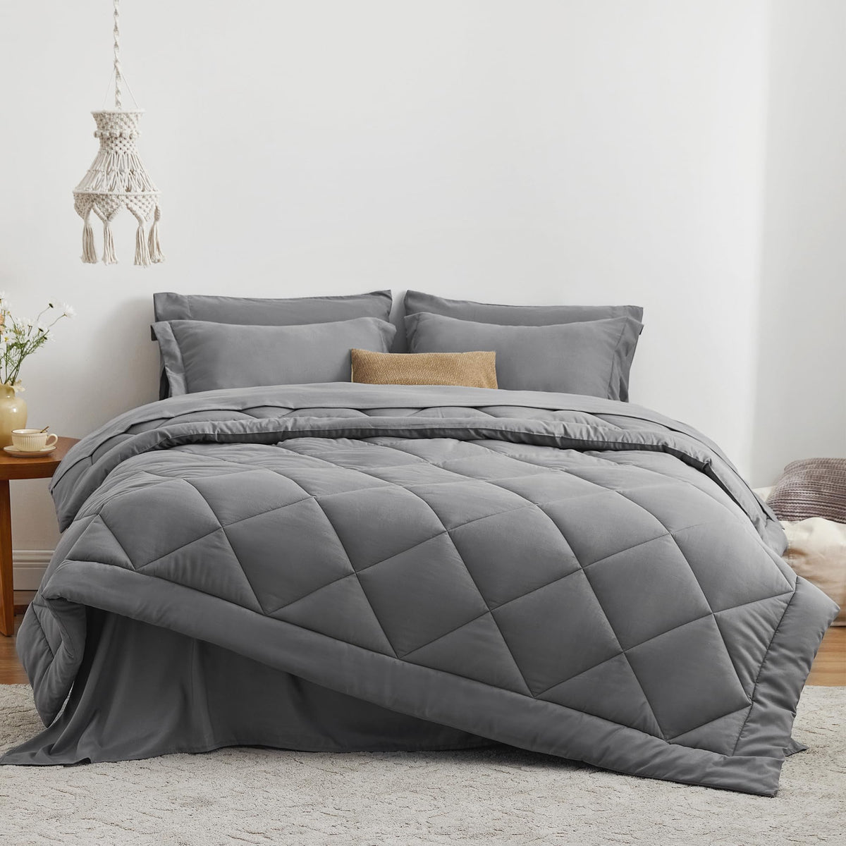 Love's Cabin grey comforter set on bed demonstrating all-season cozy styling