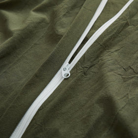 Interior corner ties secure duvet insert inside LOVQUE cover.