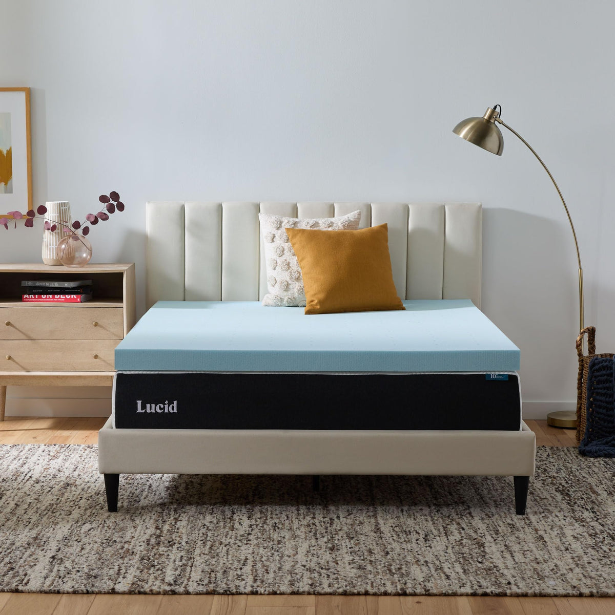 Lucid 3in memory foam topper on bed offering cooling gel comfort.