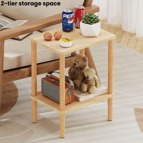 LUCKNOCK solid wood side table in a bedroom setup beside the bed