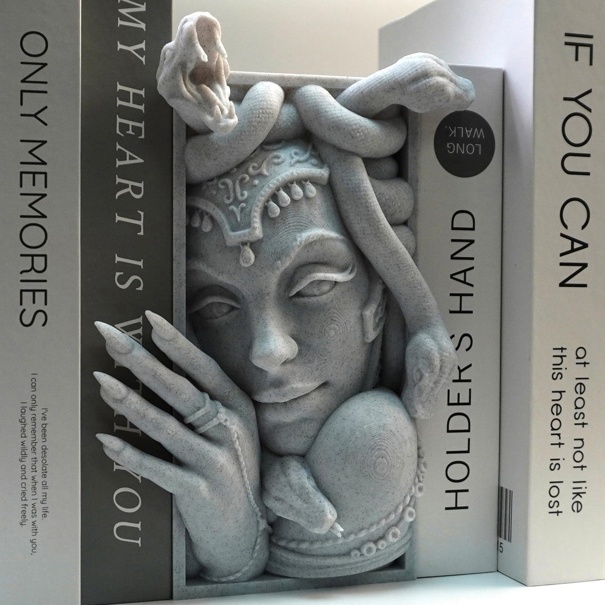 LuckyVin Medusa decorative bookend on desk blends style with practical book organization.