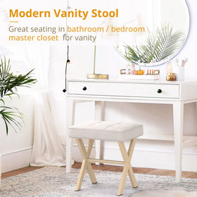LUE BONA makeup stool seat is plush and tufted for comfort.