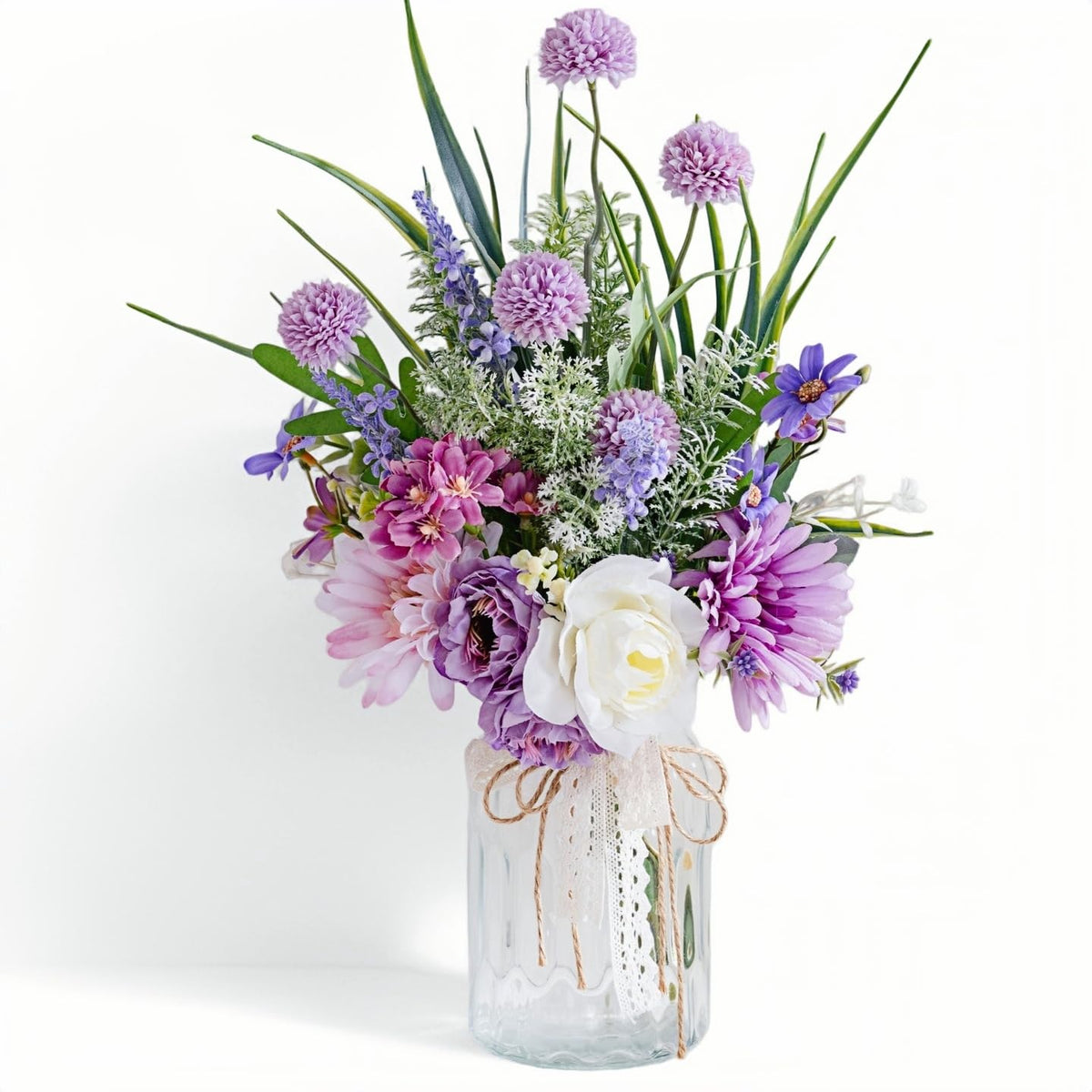 LUEUR artificial flowers in vase front view showcasing vivid Transvaal daisies for bright home decor.
