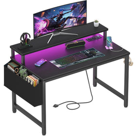 Lufeiya small desk with LED strip creates study and gaming ambiance.