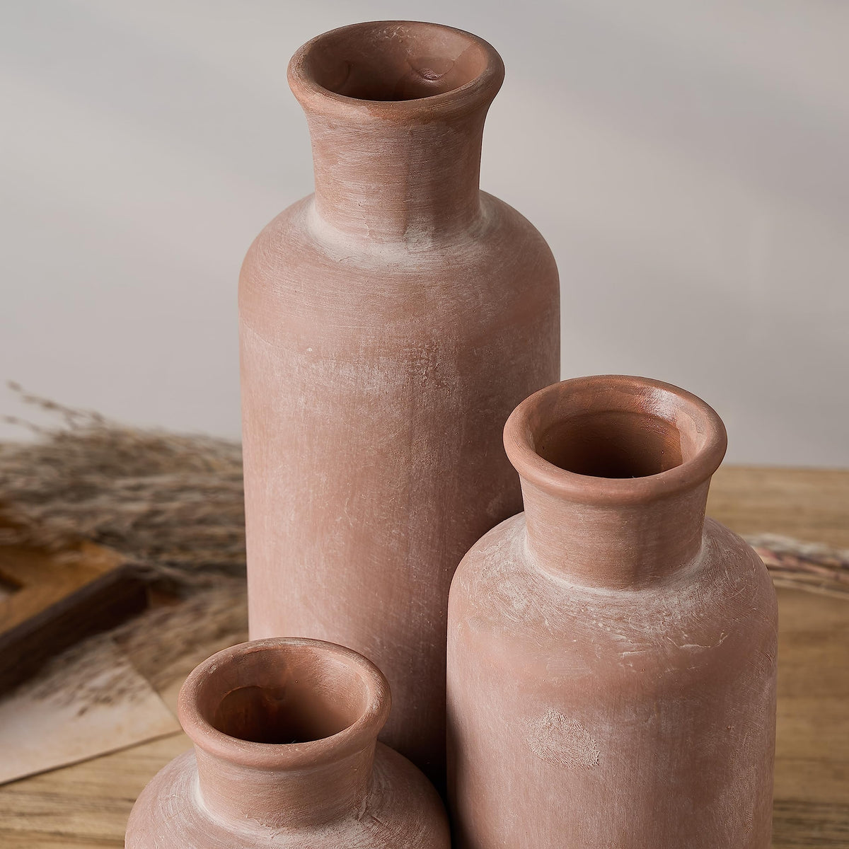 LUKA vases styled in a bedroom for a calm, cozy ambiance.