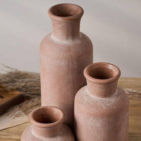 LUKA vases styled in a bedroom for a calm, cozy ambiance.