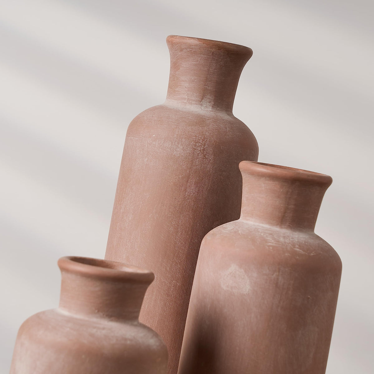 LUKA rustic vases with faux stems for quick seasonal decor updates.