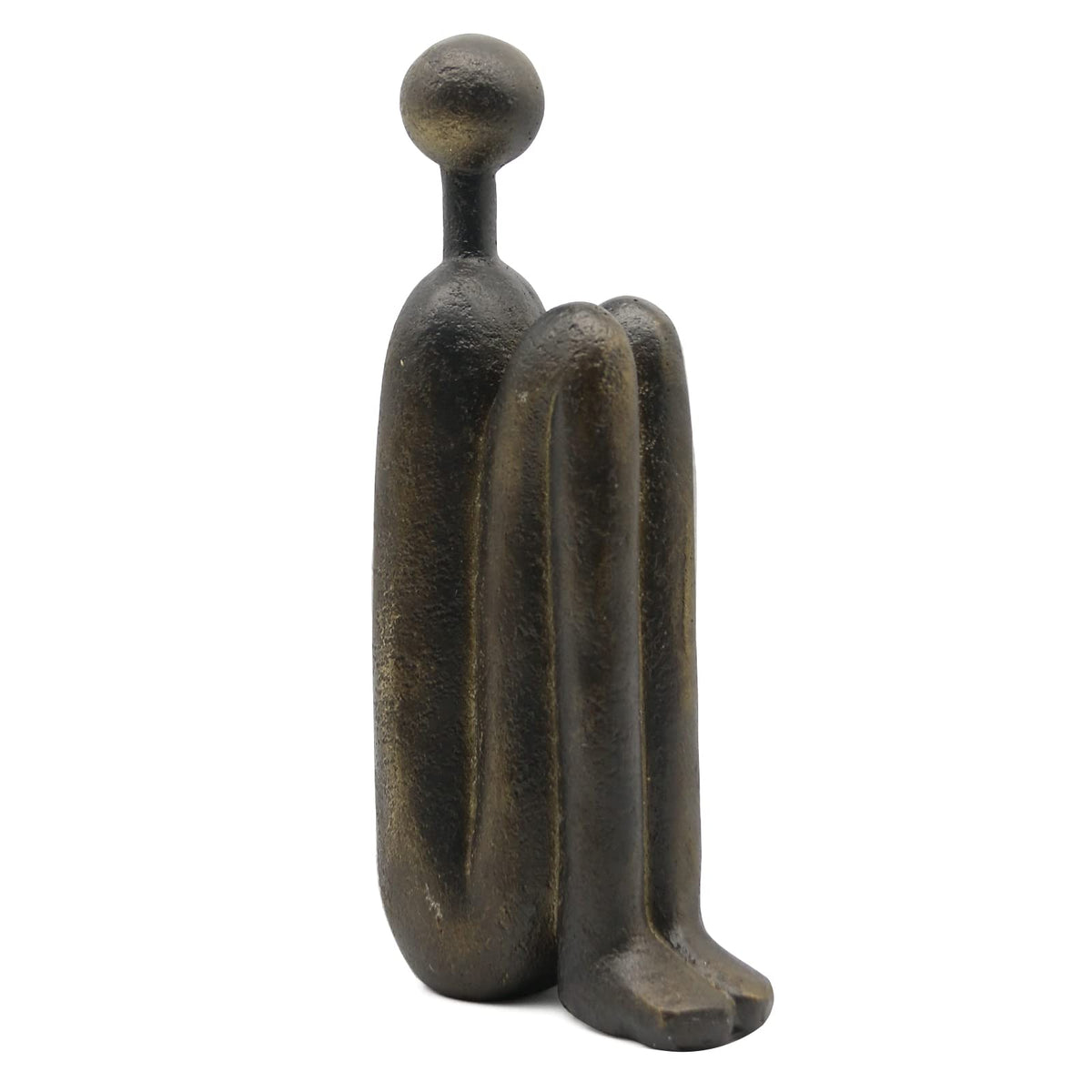 Lukitas thinker sculptures elevate living room shelf styling