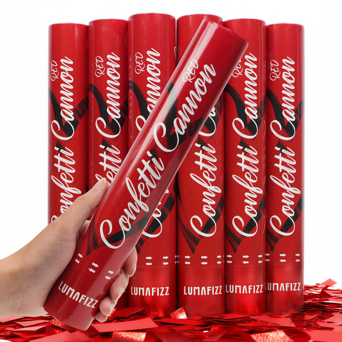 LUMAFIZZ red confetti cannon creates a dramatic wedding moment with gold sparkle.