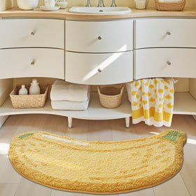 LUMI banana rug in bathroom scene offers a warm, dry surface after showers.