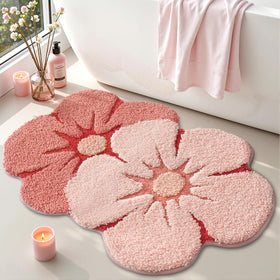 LUMI flower bath rug in Bliss Pink, absorbs water for a dry bathroom floor.