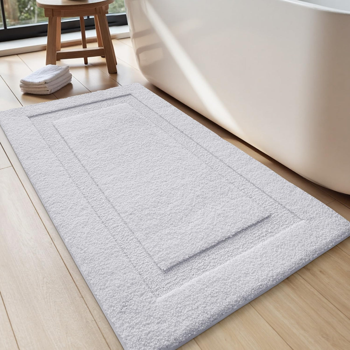 LUMI Ultra Soft bath rug with non-slip backing for safer bathroom floors.
