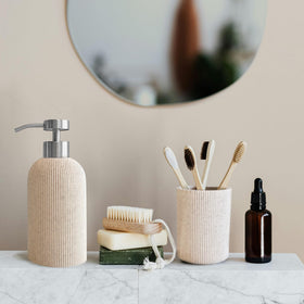 Lunestella sand-beige countertop stand demonstrates compact, space-saving bathroom organization.